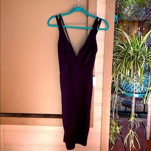 Cocktail dress with tags still on. size medium